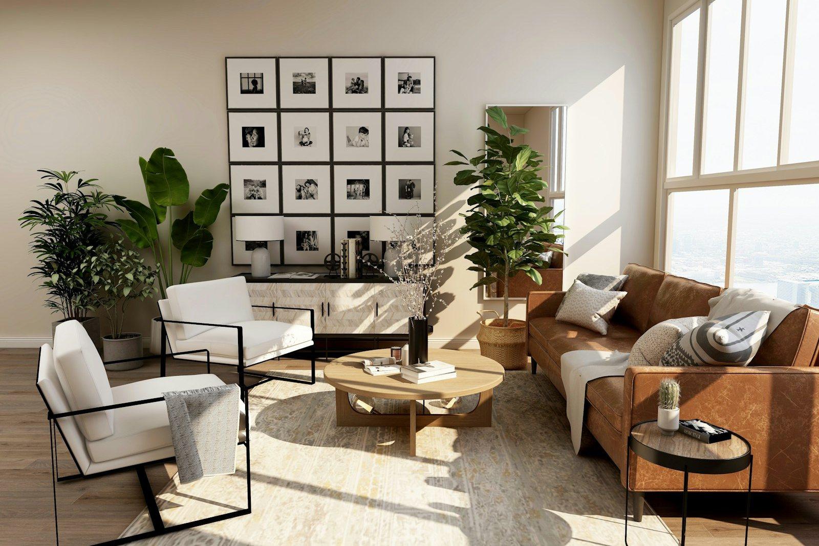 Reception room with full-height windows opening onto a distant skyline seen from height, a tan leather sofa, pale bouclé armchairs and a grid of framed black-and-white photographs on the far wall.
